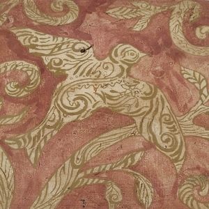 Kate McRostie hand-painted tile wall hanging with bird in bole